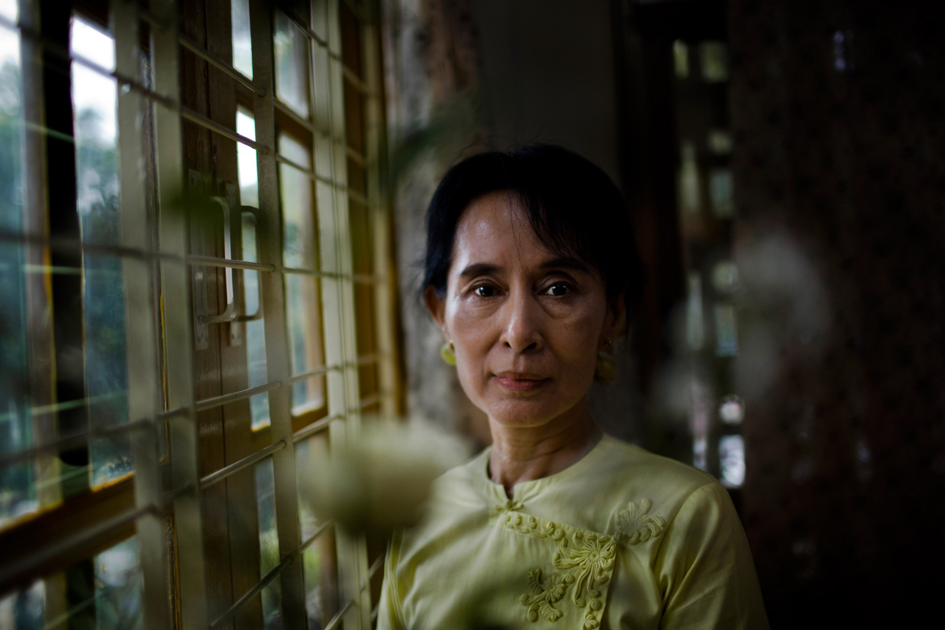 Myanmar democracy icon Aung San Suu Kyi poses for a portrait at the National League for Democracy (NLD) headquarters in Yangon on December 8, 2010 in Yangon, Myanmar